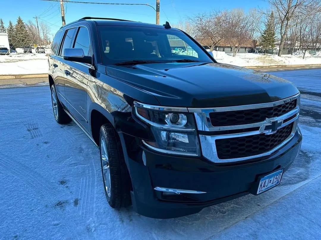 A freshly fixed and restored black Chevrolet, showcasing a renewed appearance after maintenance or repairs, emphasizing the meticulous attention given to the restoration process.
